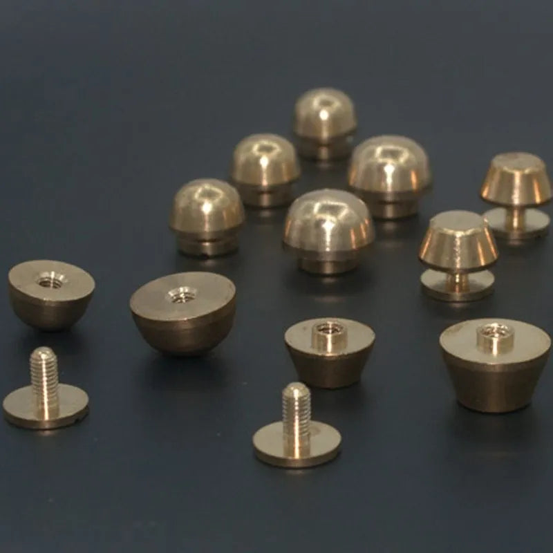 Brass decorative buckle with antique foot nail design in four size variations