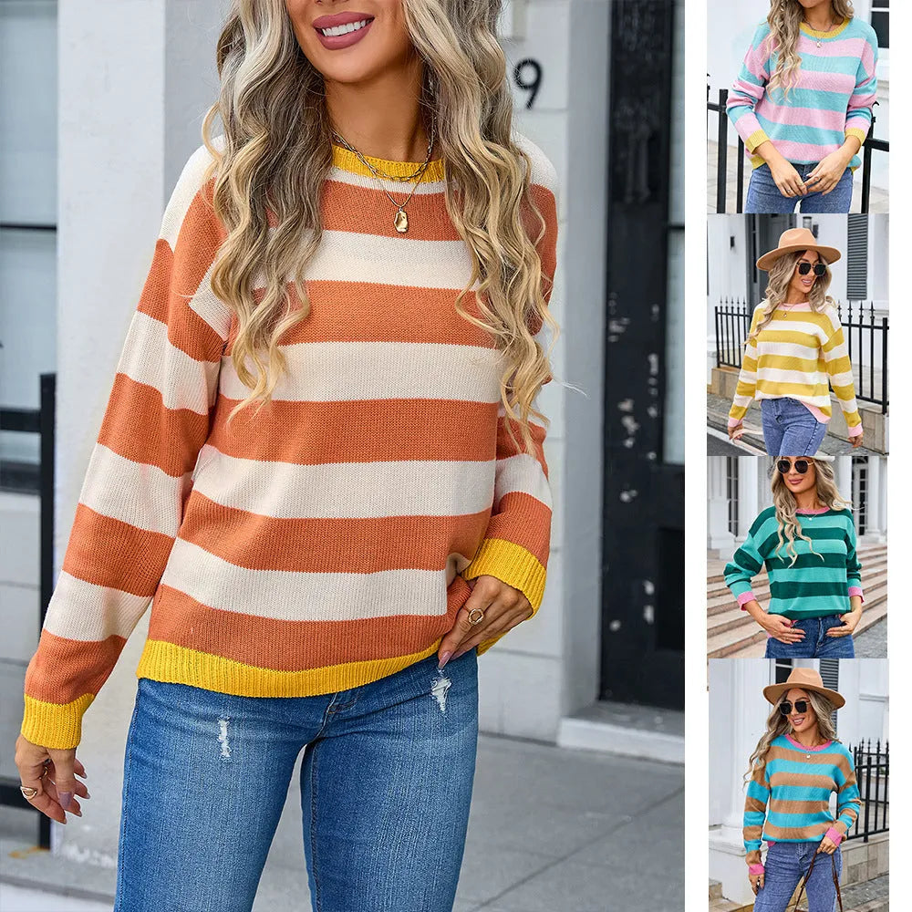 Loose fit women's acrylic sweater with round neck and long sleeves on a hanger