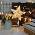 Rattan LED decorative light set showing star, heart and moon designs with copper wire details