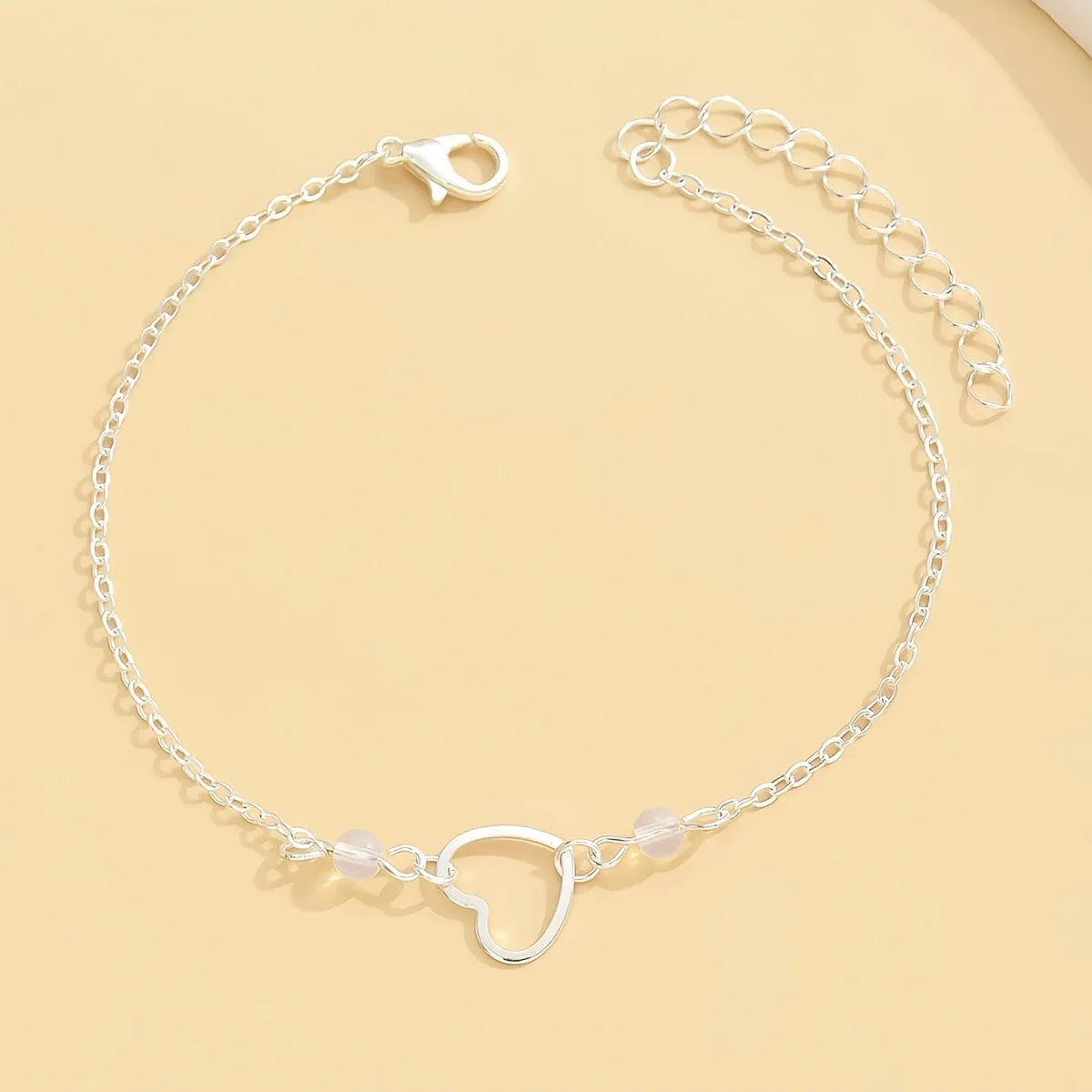 Gold and silver adjustable anklet with heart pendant for women