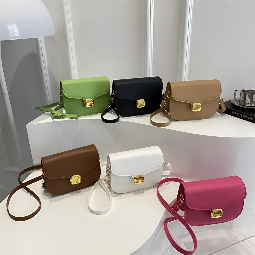 Simple PU leather handbag for women with zipper closure, available in multiple colours including black, brown, and green