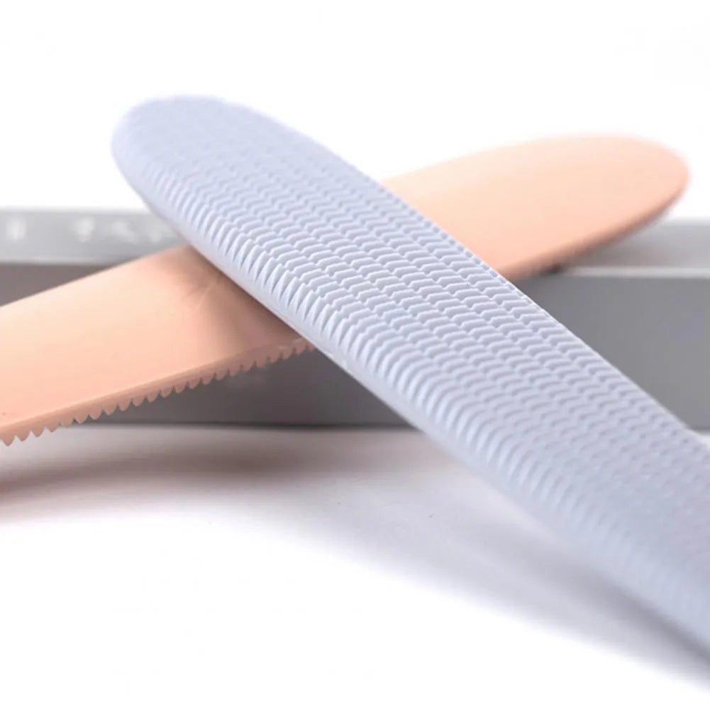 Gray ABS cat comb with tongue massage surface and ergonomic handle