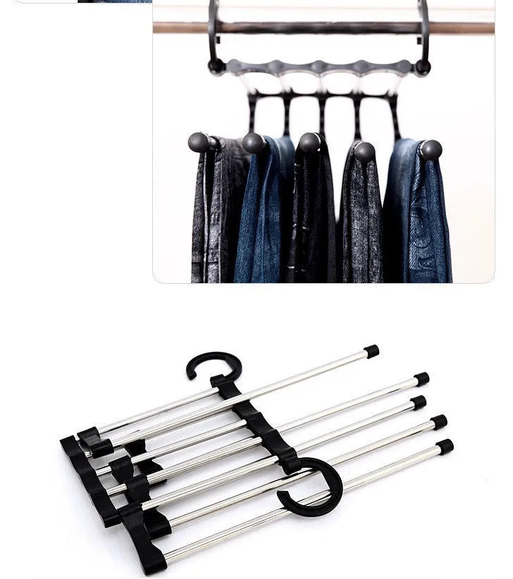 Black 5-in-1 stainless steel trouser hanger with five booms and dual hooks on a clothes rack