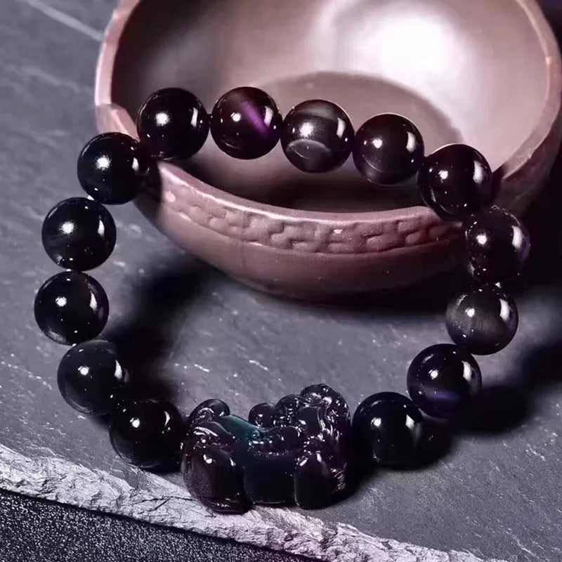 Natural ice colour eye obsidian crystal bracelet with round beads on wrist