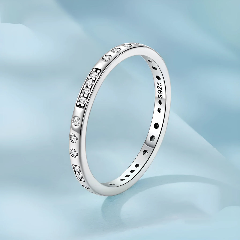 SCR1157 Moss Password I Love You oxidised black silver ring on a hand, showing simple bracelet style.