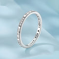 SCR1157 Moss Password I Love You oxidised black silver ring on a hand, showing simple bracelet style.
