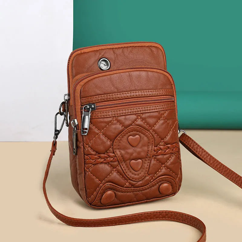 Women's PU leather strapped shoulder bag in vertical square shape, solid colour, with zipper closure and internal pockets