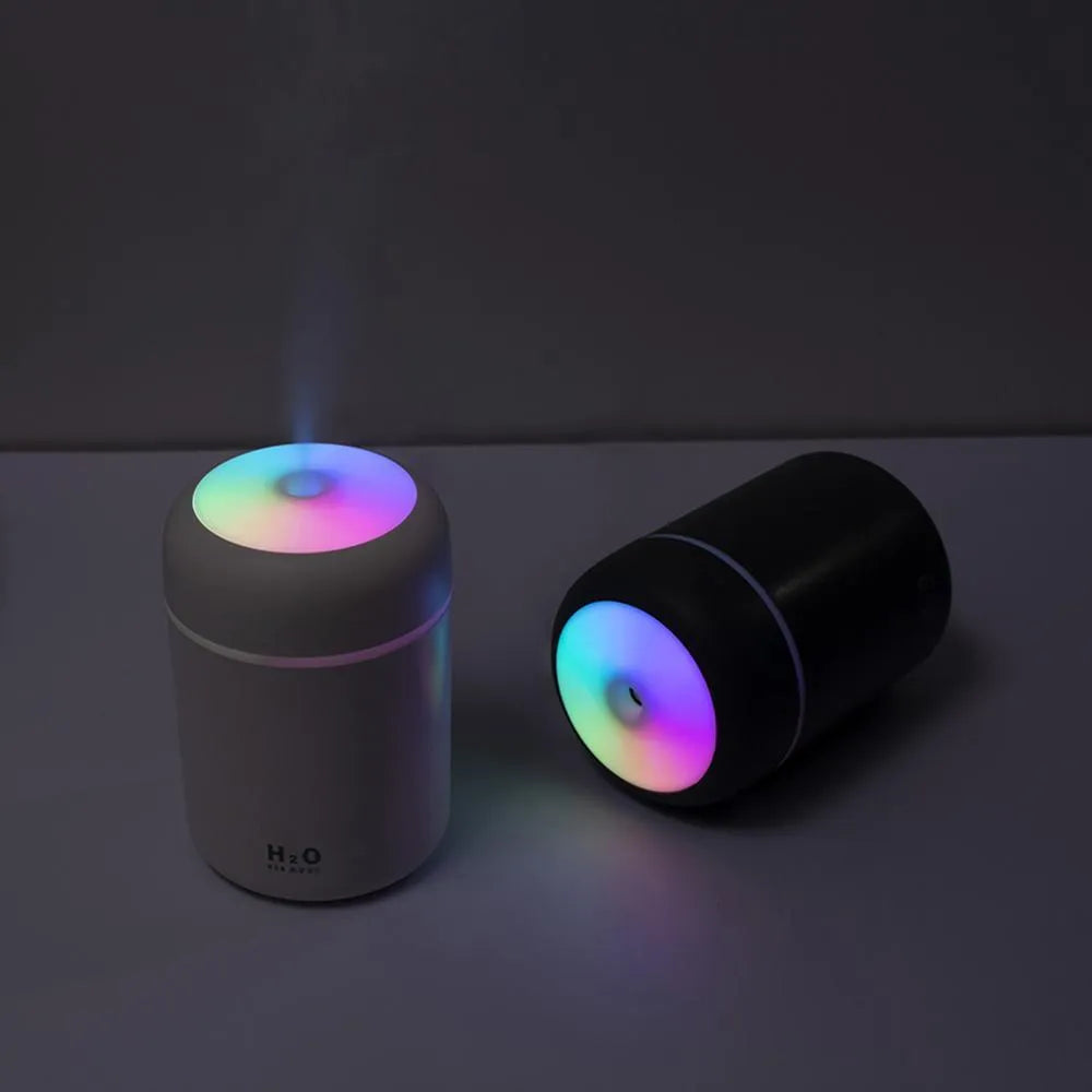 Mini USB desktop humidifier in pink with 300ml tank, low noise, and colourful atmosphere lights