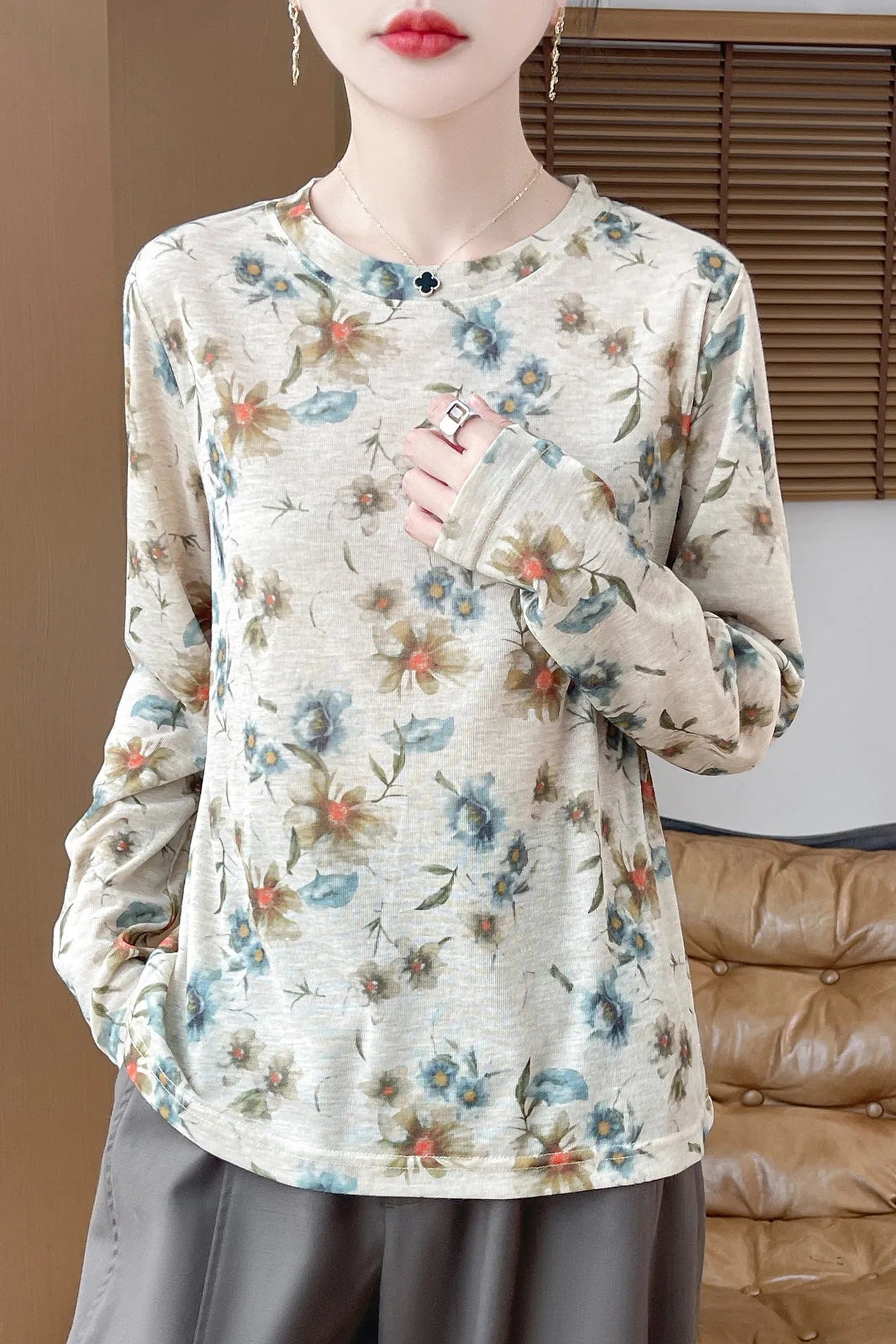 Ladies' round neck pullover shirt with floral printed design in Tencel cotton knit fabric.