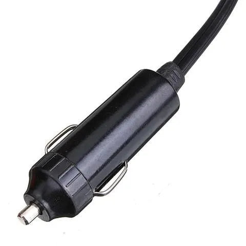 Portable car windshield defroster fan in black and red ABS housing on dashboard with power cable