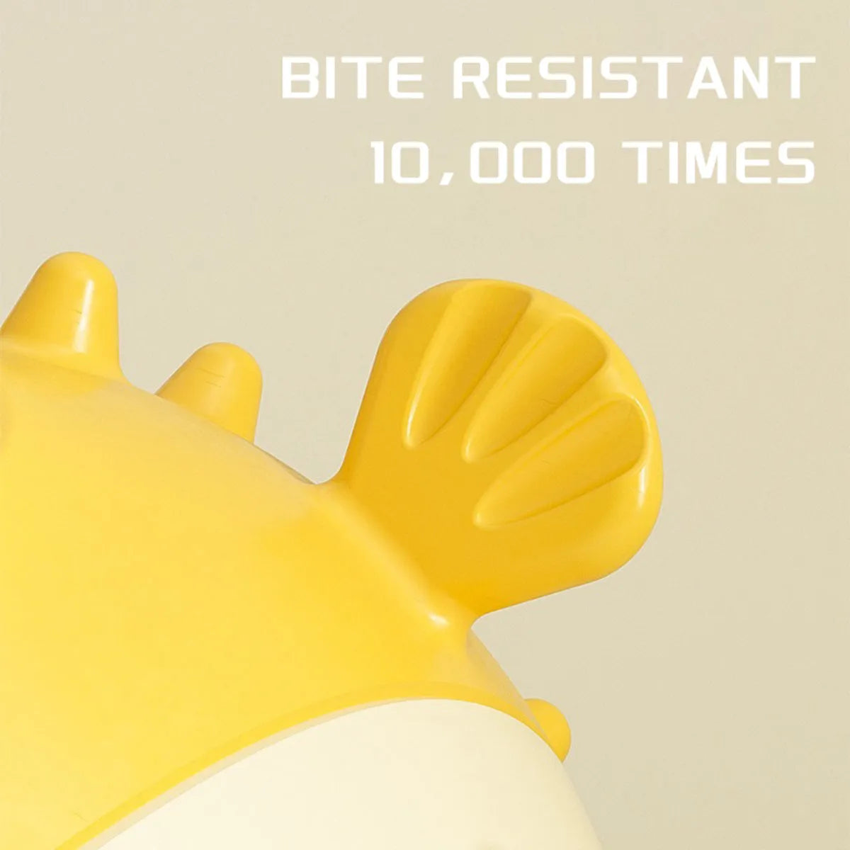 Yellow fish-shaped vinyl dog chew toy with textured surface and squeaker inside.