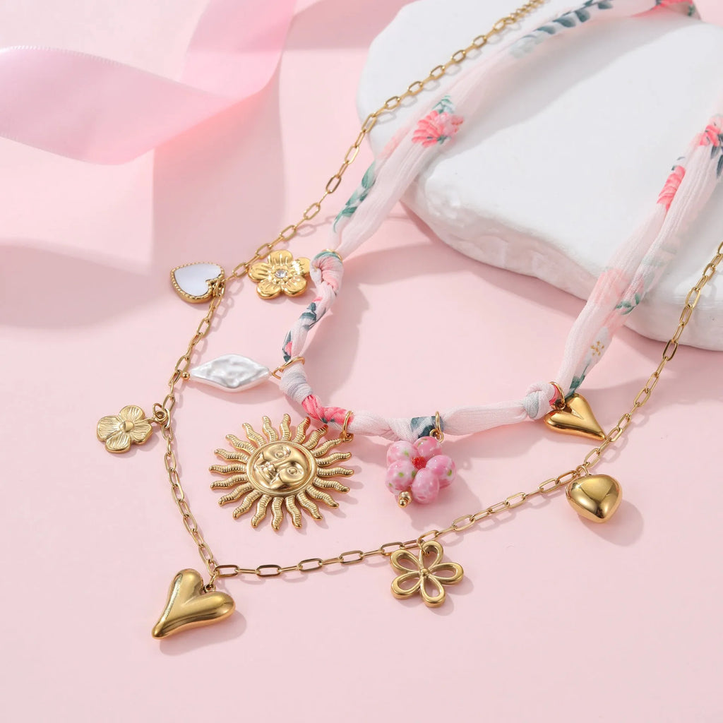 Women's stainless steel necklace with geometric sun pendant on adjustable 41-50cm chain