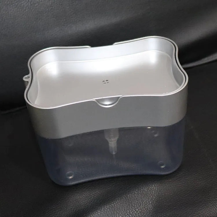 Compact plastic kitchen soap dispenser in silver, 14.5 cm tall, on a countertop