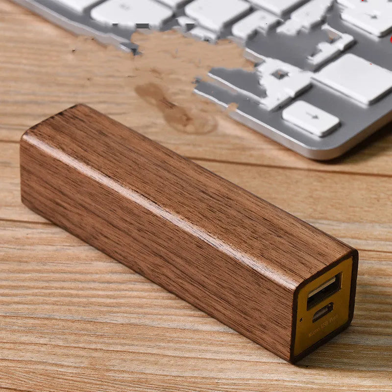 Portable black walnut solid wood power bank with 2000mAh capacity, brown colour, 100mm cylindrical design