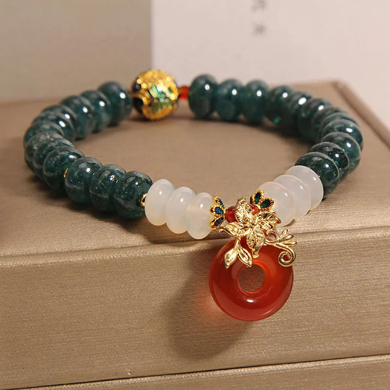 Blue water jade abacus beads crystal bracelet with red agate peace buckle and rhinestone accents for women