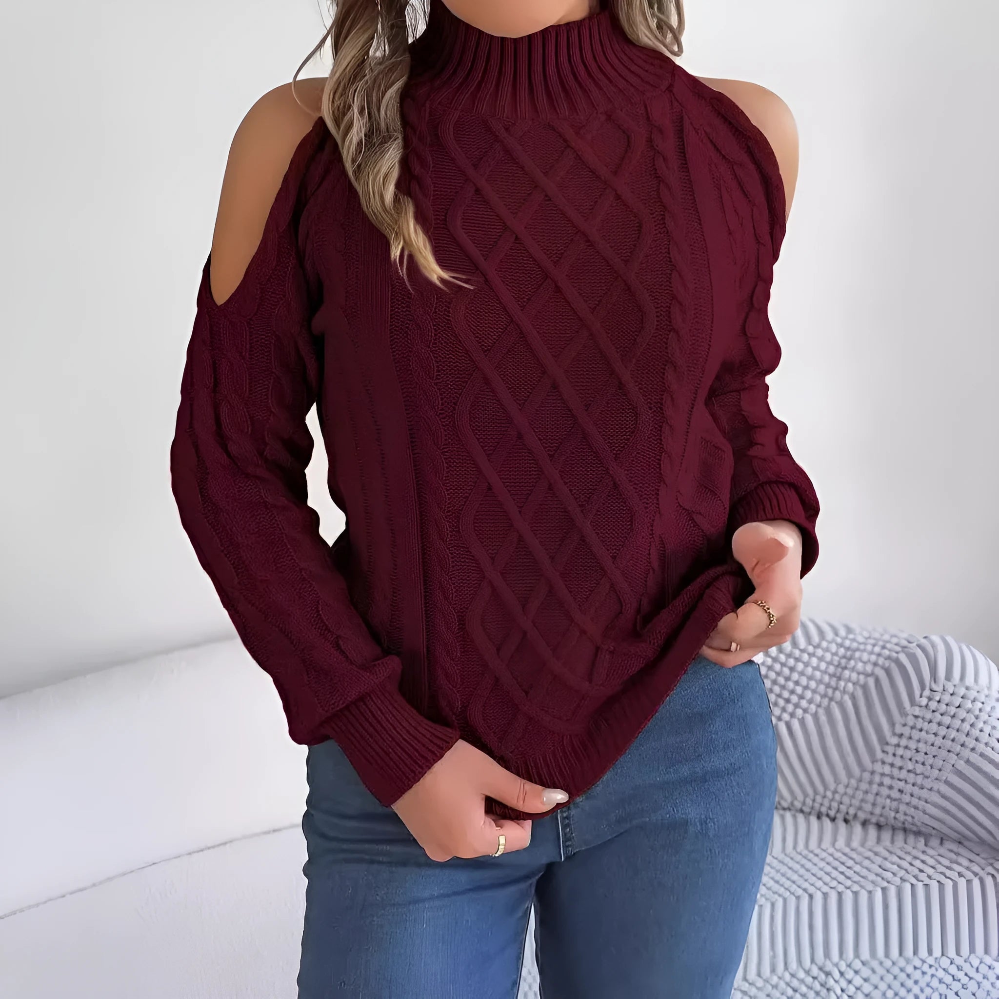 Grey women's casual sweater with twisted pattern, half-high collar, and long lantern sleeves.