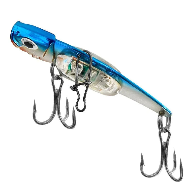 Luminous metal vib electronic fishing lure in blue and red body colours for casting and trolling