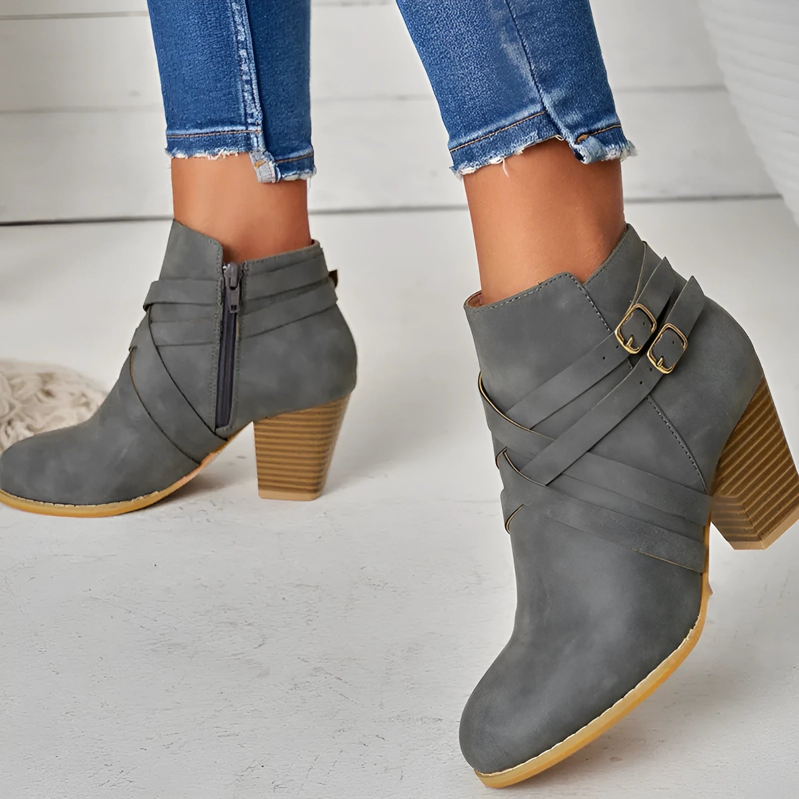 Plus size black short boots with side zip, buckle detail, and a 7cm thick heel.
