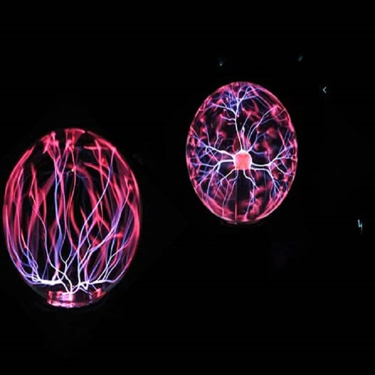 Anti-radiation magic ball light with colourful glow, 7.62cm glass sphere and ABS base on a desk