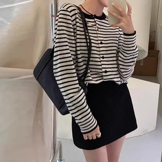 Dark grey and white striped women's cardigan with long sleeves and a short 40cm length.