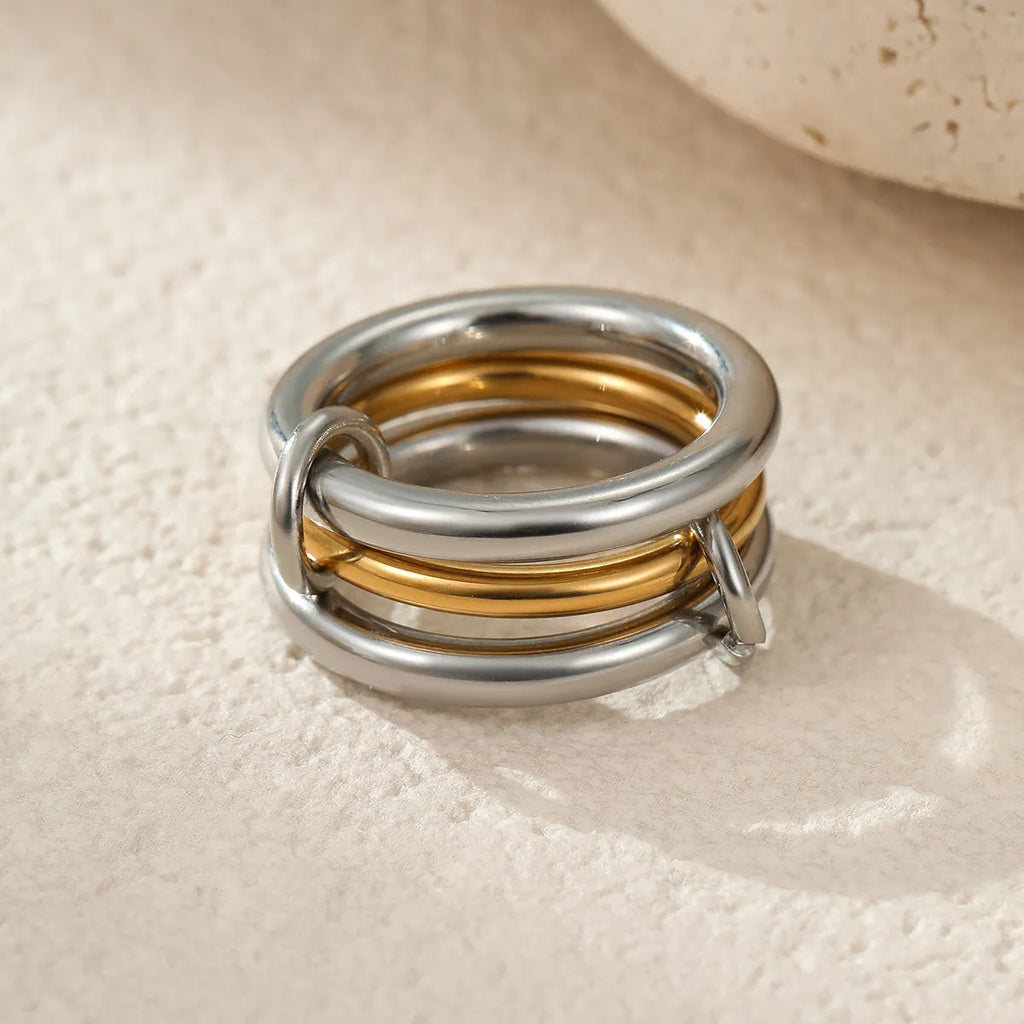 Stacked stainless steel rings with 18K gold plating in colour matching design