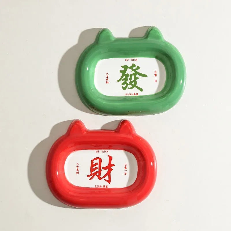 Ceramic animal-shaped cat bowl in a colourful design for pet feeding