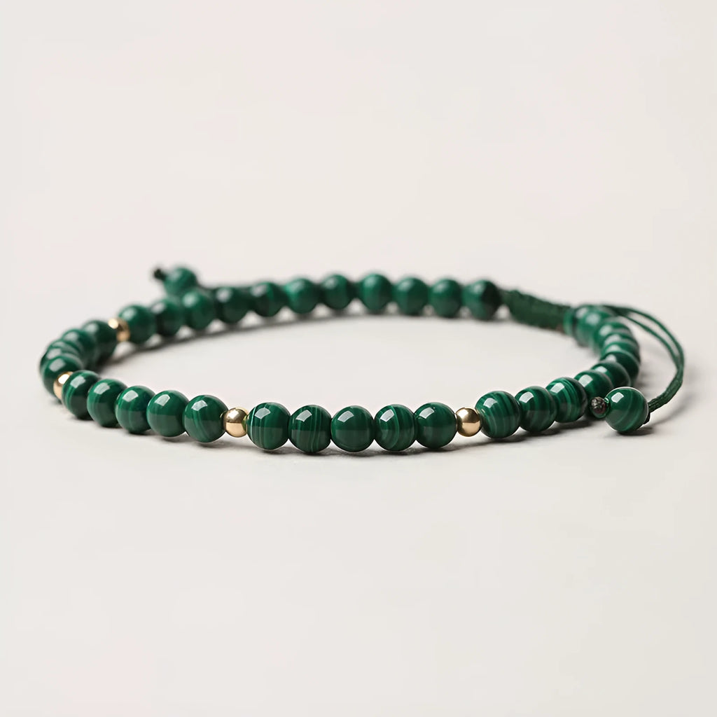 Natural malachite crystal bracelet for women with handwoven golden balls strap and textured green stone