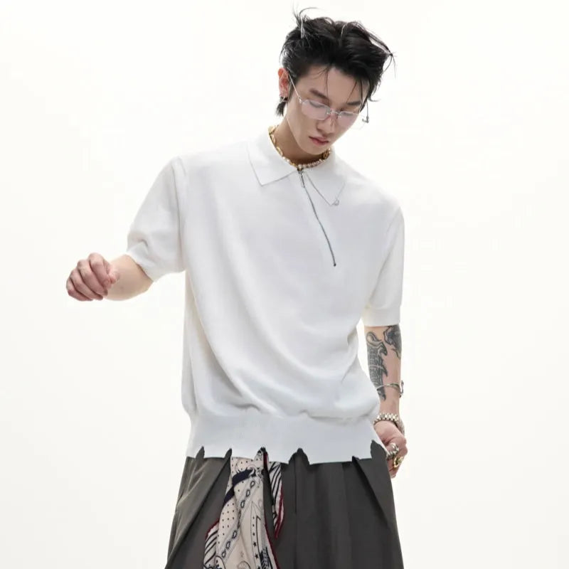 Slim fit grey knitted polo shirt with an oblique diagonal zip and short sleeves on a mannequin.