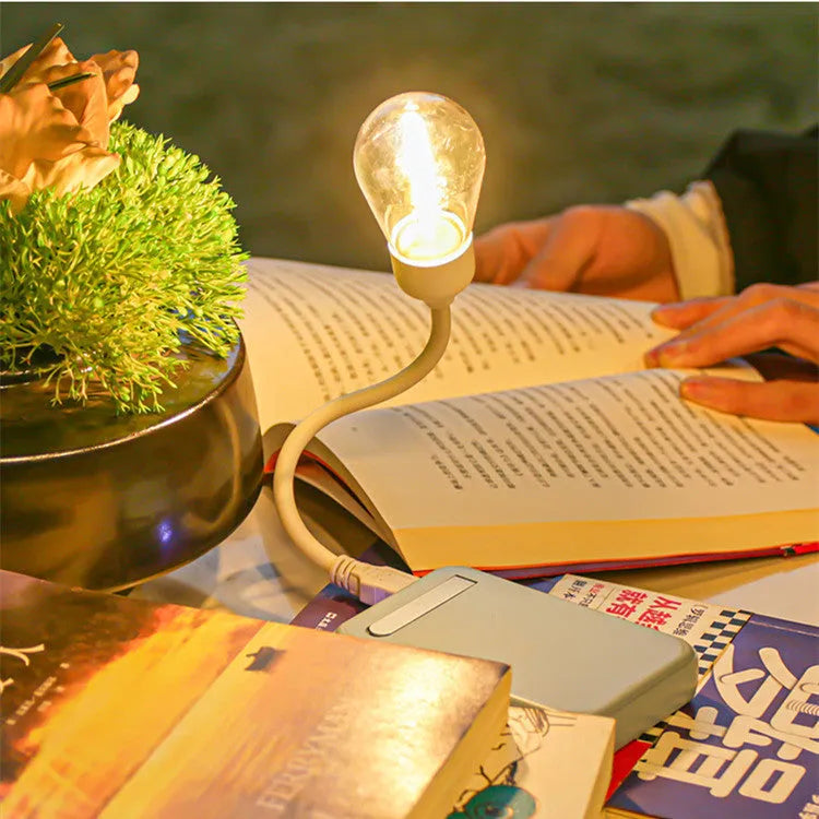 USB rechargeable folding night light with warm white tungsten bulb, shown in open and closed positions.