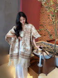 Women's casual polyester scarf cape with tassel trim in free size shawl style