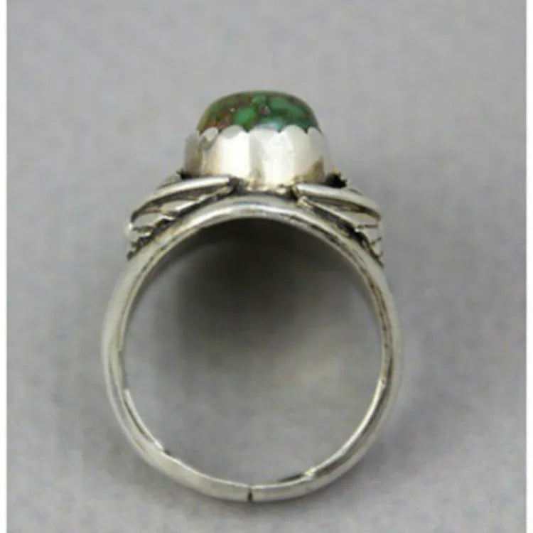 Turquoise geometric women's ring with electroplated alloy construction showing inlaid design details