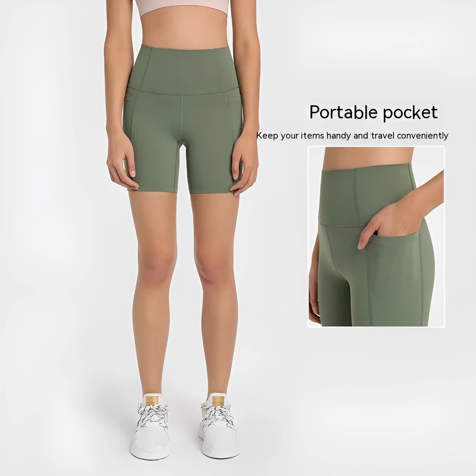 Women's tight-fitting mid-thigh sports shorts in grey lake green for fitness.