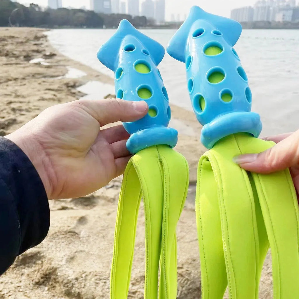 Blue dog chew toy shaped like a cuttlefish with squeaker for teeth cleaning and interactive play