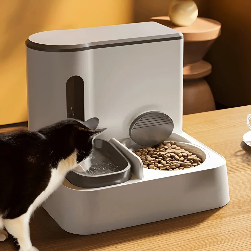 Grey automatic cat feeder with integrated water dispenser and stainless steel bowls