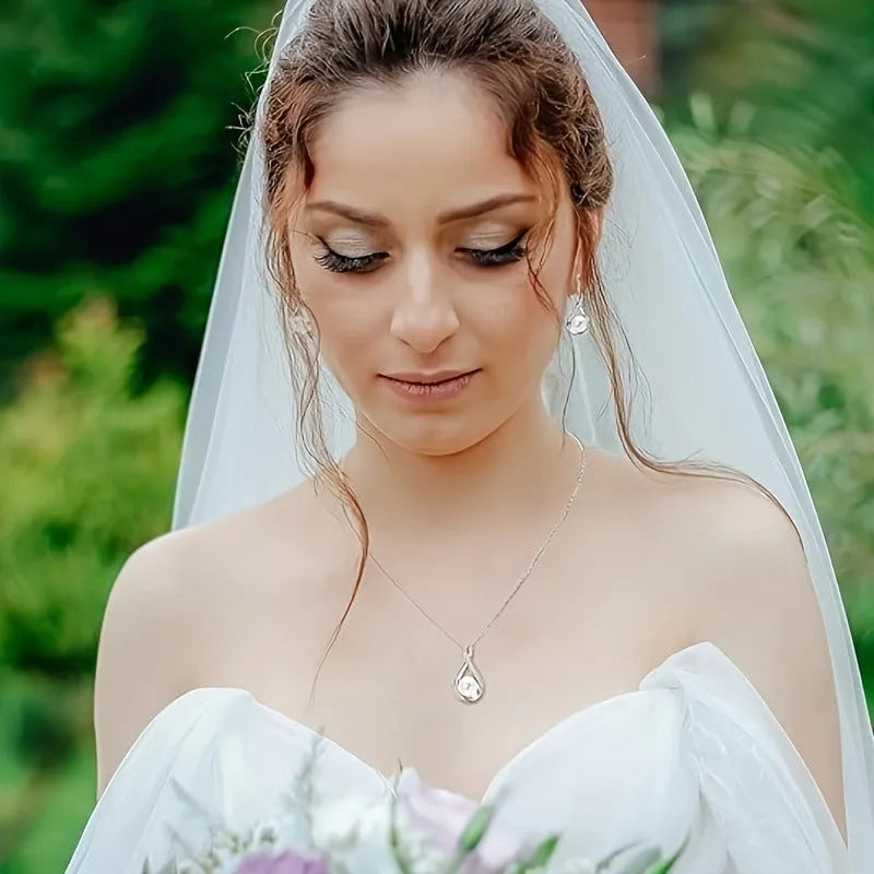 Simulated pearl necklace with diamond inlaid love heart pendant on alloy clavicle chain in gold finish