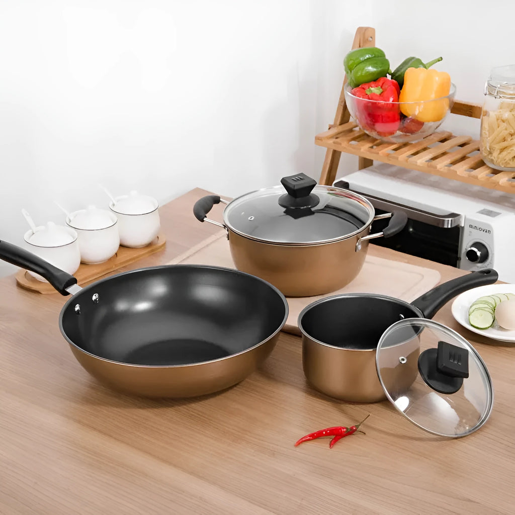 Three-piece cast iron non-stick cookware set with soup pot milk pot and wok in light luxury style