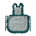 Minimalist cotton linen lace X strap apron in light pink on a white background