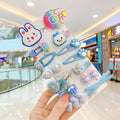 14PCS toddler hair accessories set with rainbow barrettes and colourful fruit and butterfly patterns on white background