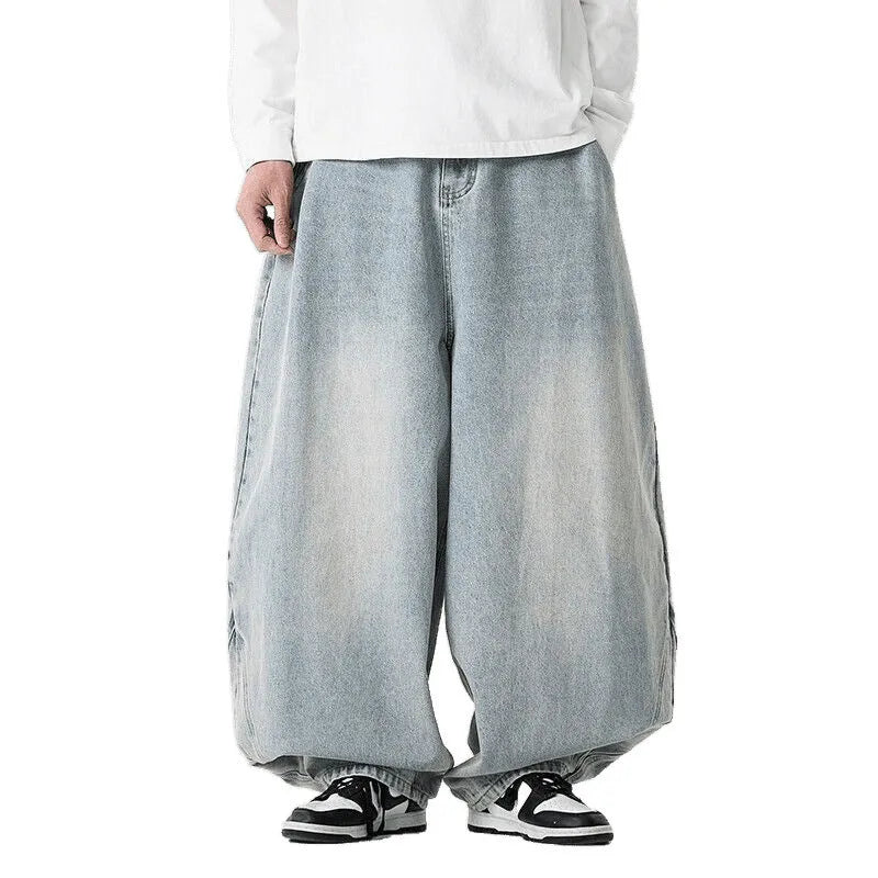 Men's plus size baggy jeans in light blue cotton denim with wide leg straight cut