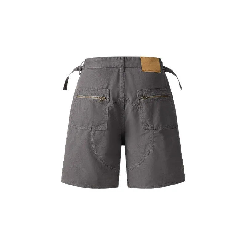 Retro workwear shorts in washed cotton with loose fit and half elastic waistband
