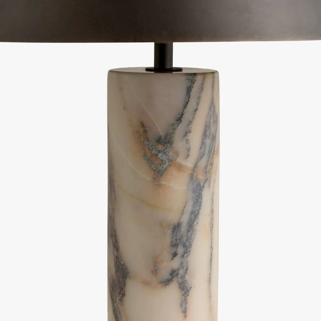 Black marble table lamp with modern minimalist design on wooden surface