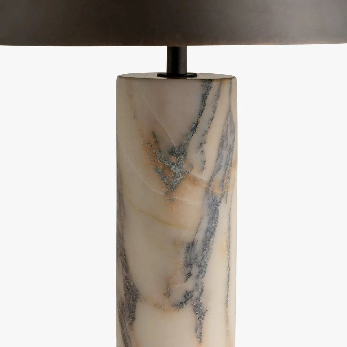 Black marble table lamp with modern minimalist design on wooden surface