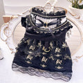 Golden gothic princess-style skirt for a small dog or cat on a mannequin.