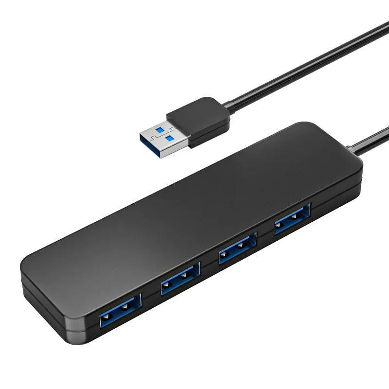 USB 3.0 hub splitter with 4 ports and black LED indicators on a desk