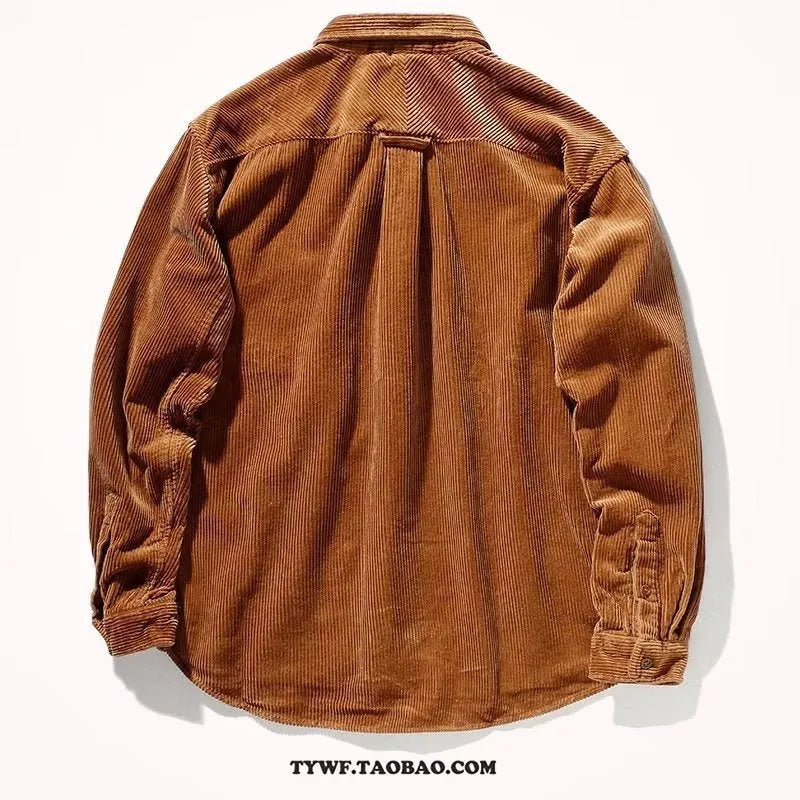 Loose long sleeve corduroy shirt in caramel colour, cardigan style, laid flat.