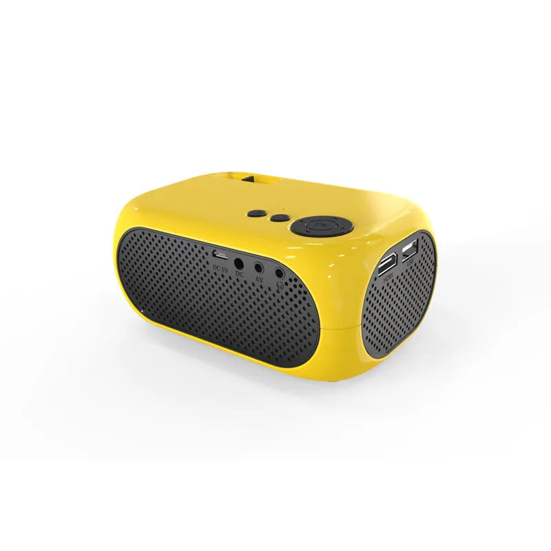 Compact gold and white M24 micro mini LED projector on a table with power adapter and AV cable.
