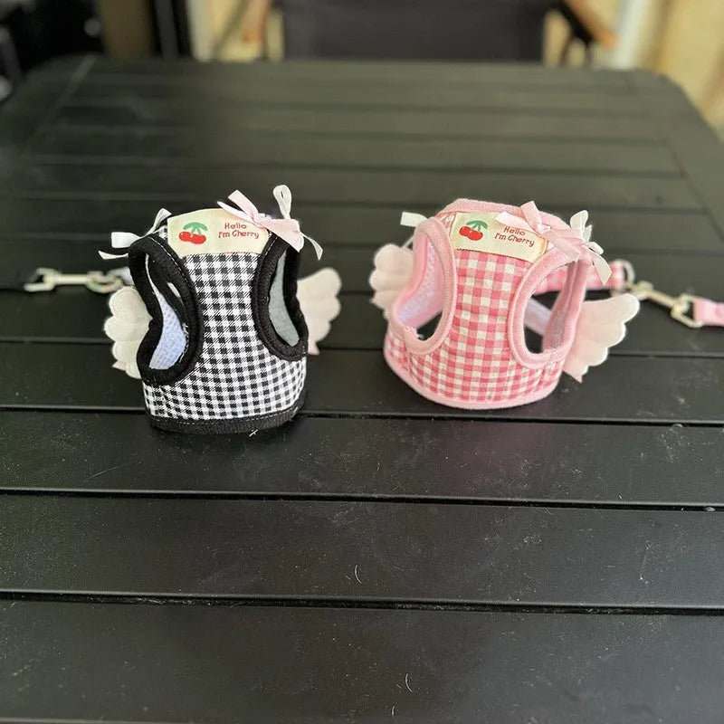 Pink and black cotton harness for small dogs with chest and back support and attached hand-holding rope