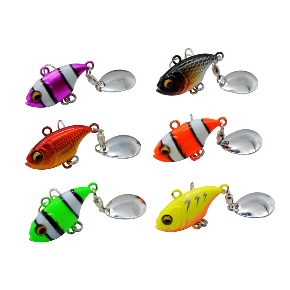 Metal sea fishing iron plate lure with rotating sequins in gold colour.