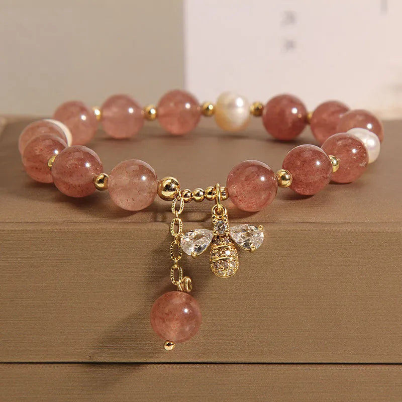 Women's freshwater pearl and strawberry quartz bracelet with zircon accents and adjustable closure