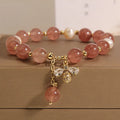 Women's freshwater pearl and strawberry quartz bracelet with zircon accents and adjustable closure